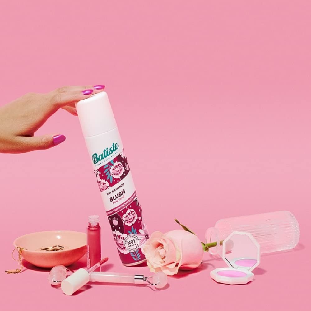 Batiste applied to hair before and after to show cleaner-looking roots