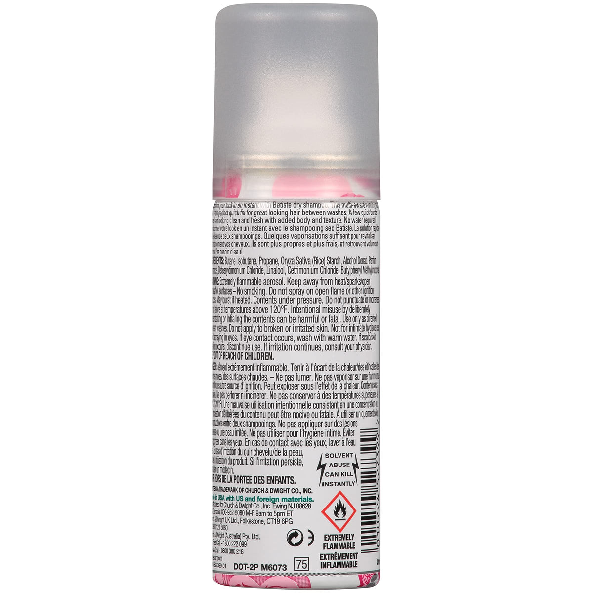 Applying Batiste dry shampoo to roots, lifts oil and adds instant volume