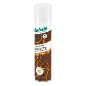 Batiste medium brunette held in hand to show compact travel-friendly benefit