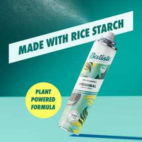 Batiste held in hand showing compact travel-friendly size