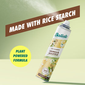 Hand holding Batiste can illustrating compact 3.81 oz travel-friendly benefit