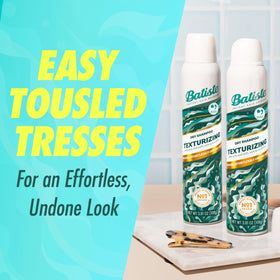 Batiste spray in use applied to roots to absorb oil and boost lift