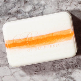 Baxter of California bar styled on bathroom shelf with other grooming items, ideal gift presentation