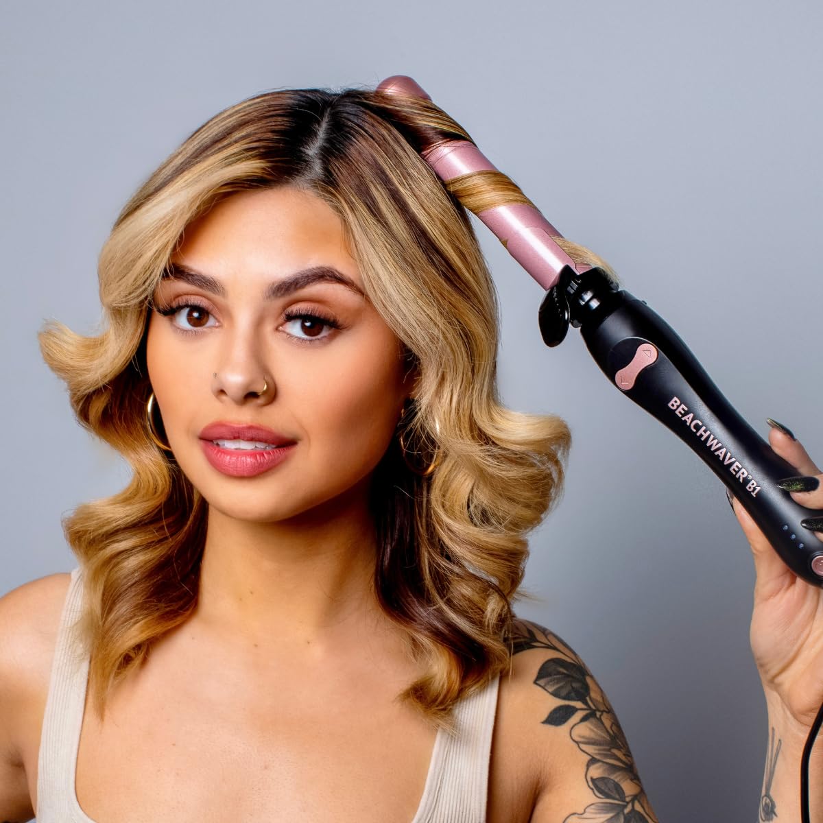Beachwaver B1 swivel cord and plug demonstrating tangle-free styling mobility
