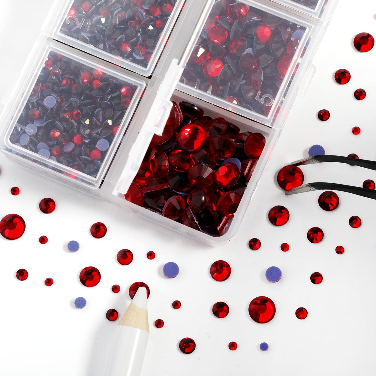 BEADSLAND rhinestones being applied to a shirt with tweezers, demonstrates clean placement