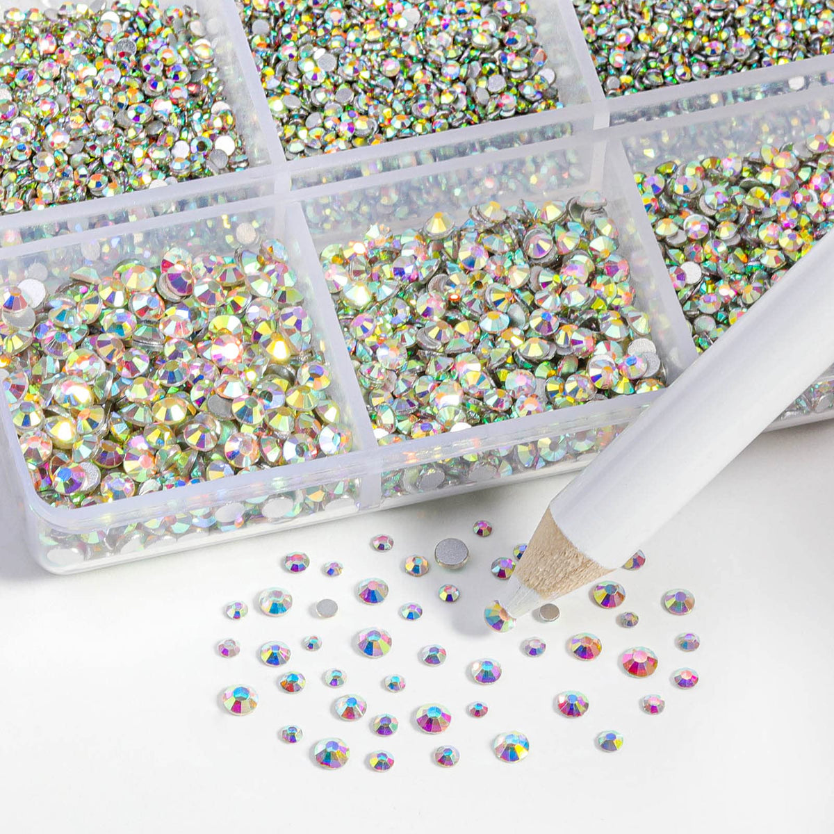 BEADSLAND wax pencil lifting a tiny rhinestone for precise placement benefit