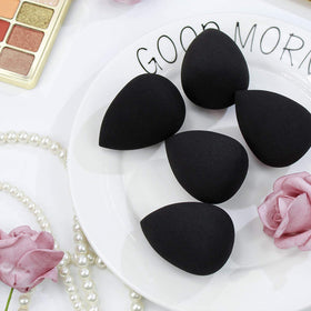 BEAKEY stained black sponges after paint use showing durability with thick products