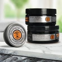 Beard Guyz jar next to a ruler showing 3 oz travel-friendly size