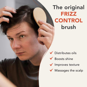 Beauty by Earth brush in use detangling long hair showing reduced breakage benefit