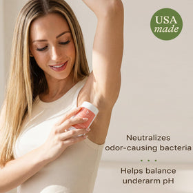Beauty by Earth applying deodorant underarm for long-lasting freshness