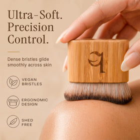 Beauty by Earth brush applying self tanner to arm for smooth streak-free coverage
