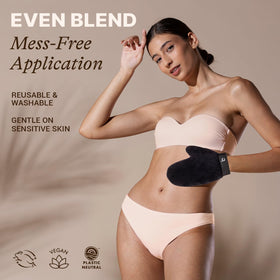 Beauty by Earth mitt being used on a leg demonstrating even, streak-free self-tanning application