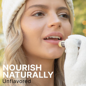 Beauty by Earth lip balm outdoors illustrating weather protection benefit