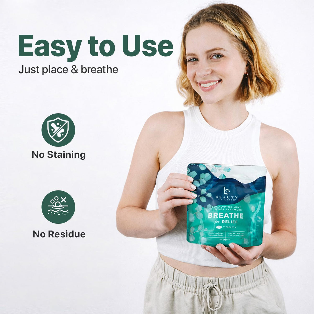 Beauty by Earth tablet mid-dissolve showing slow-release formula for extended fragrance