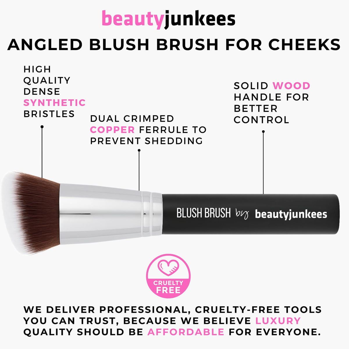 Beauty Junkees brush in hand showing size and ergonomic handle benefit