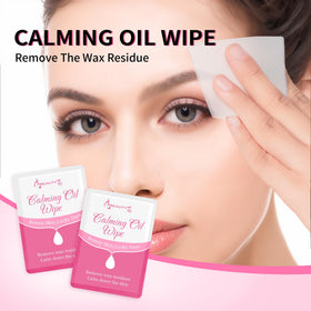 Beauty7 wipe in hand removing wax residue demonstrating easy, gentle cleansing