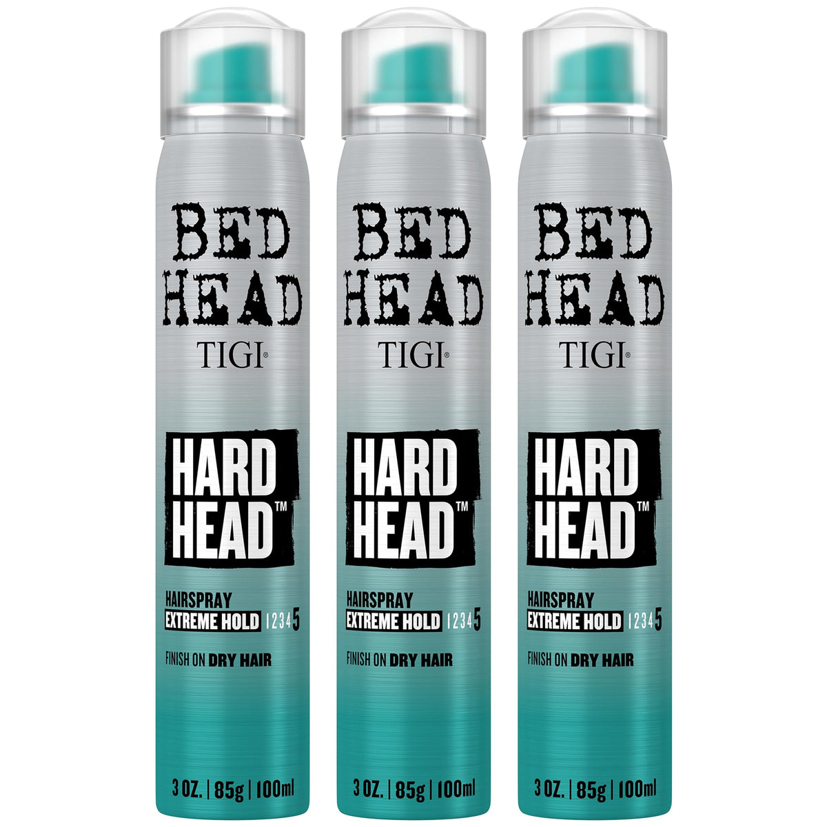 Bed Head Hard Head front packaging showing compact travel cans and apple scent benefit