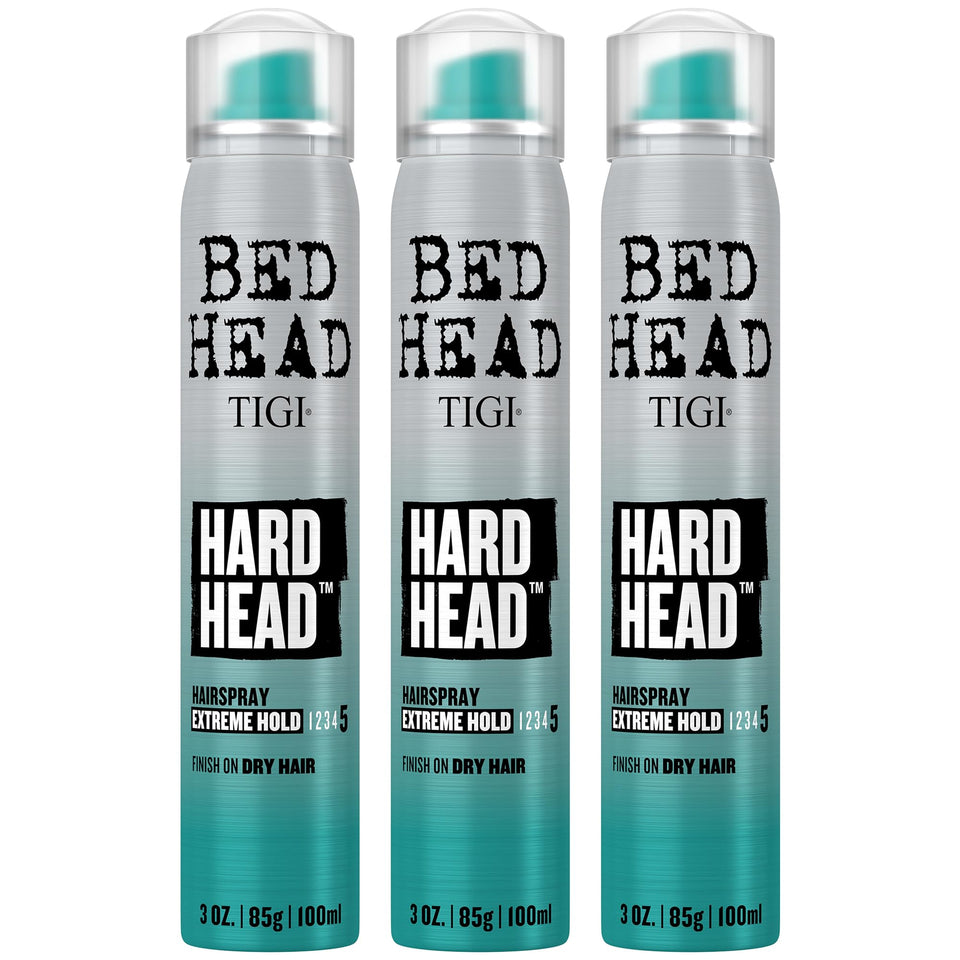Bed Head Hard Head front packaging showing compact travel cans and apple scent benefit