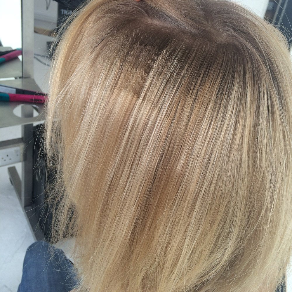 Bed Head Little Tease in use crimping near root for instant pumped-up volume