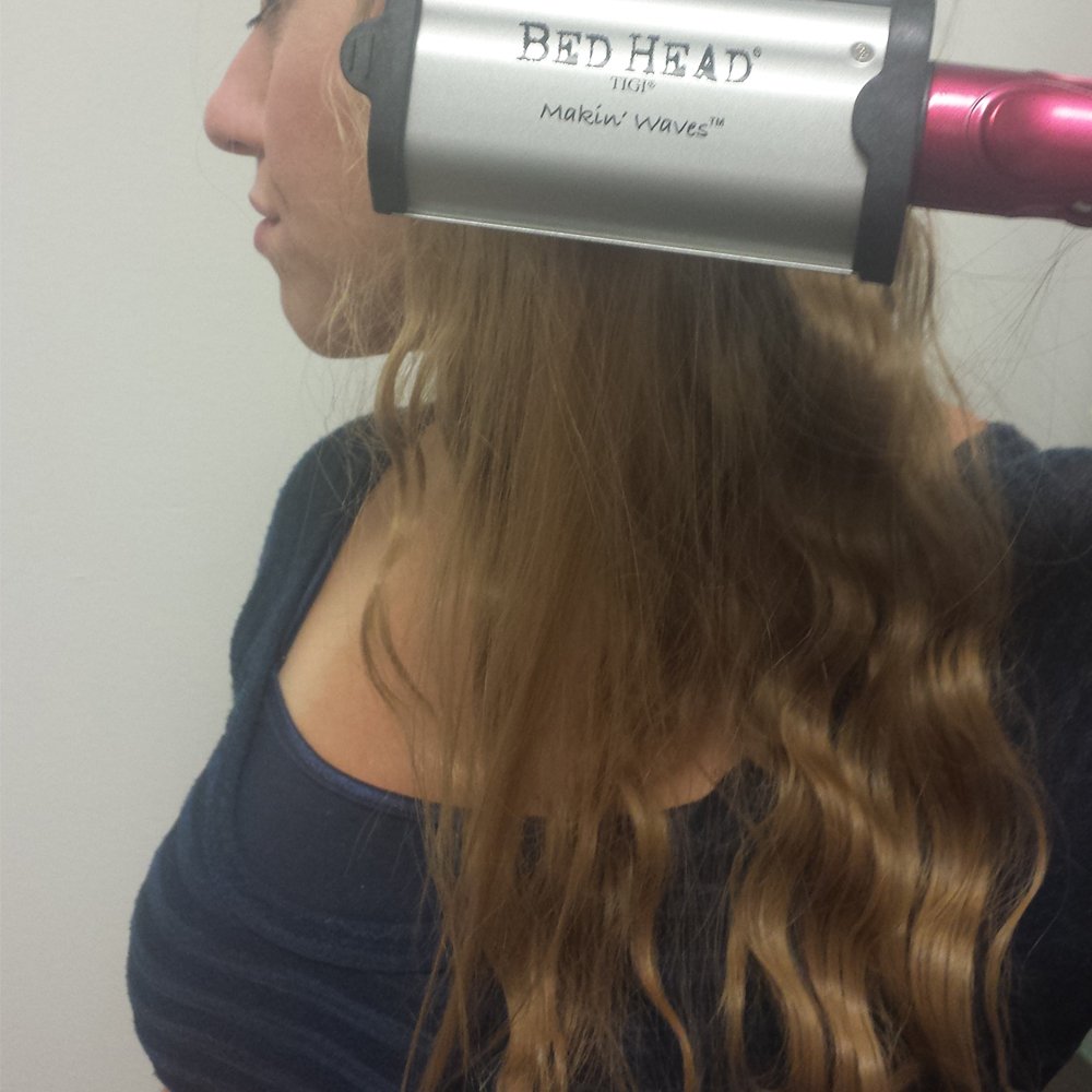 Bed Head styling long hair with S waver producing beachy waves and controlled frizz