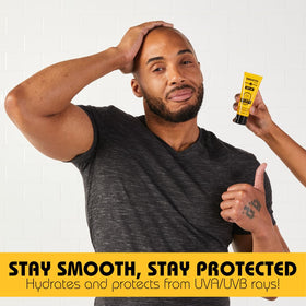 Bee Bald 1.7 oz bottle in hand demonstrating pocketable travel benefit