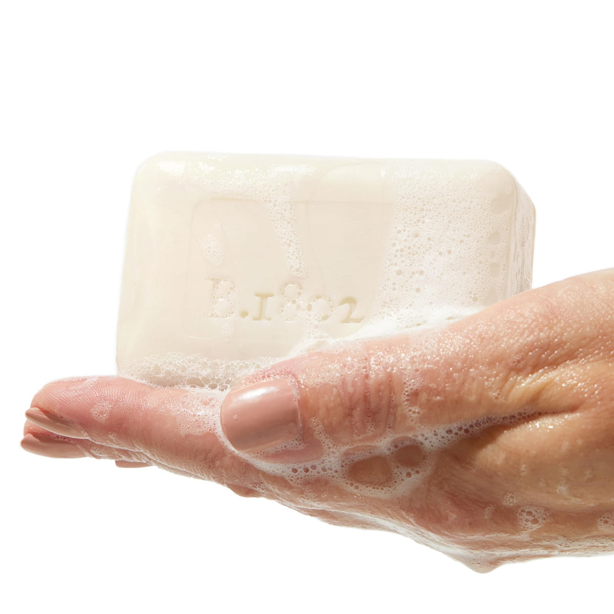 Beekman 1802 side profile of soap bar highlighting dense triple-milled feel for extended life