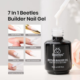 beetles builder gel cured finished nails in milky white, shows natural durable finish