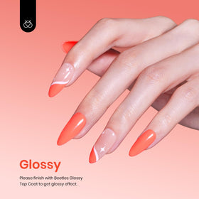 Beetles swatch on hand highlighting Carly Coral on nails for wearable summer color