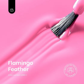 Beetles Flamingo Feather brush stroke on white card highlighting smooth application benefit