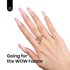 Beetles Flamingo Feather nail swatch on hand showing wearable light pink finish advantage