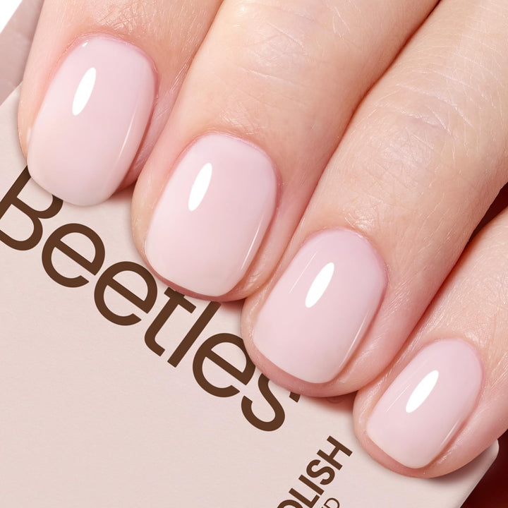 beetles bottle front view showing milky pink shade and brand benefits