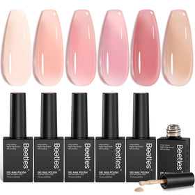 Beetles front packaging of six nude gel bottles showing compact gift-ready kit benefit