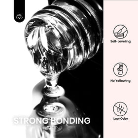 Beetles Gel Polish kit in use applying tip with lamp for durable bond