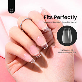 beetles Gel Polish lifestyle shot of woman wearing short coffin tips confidently