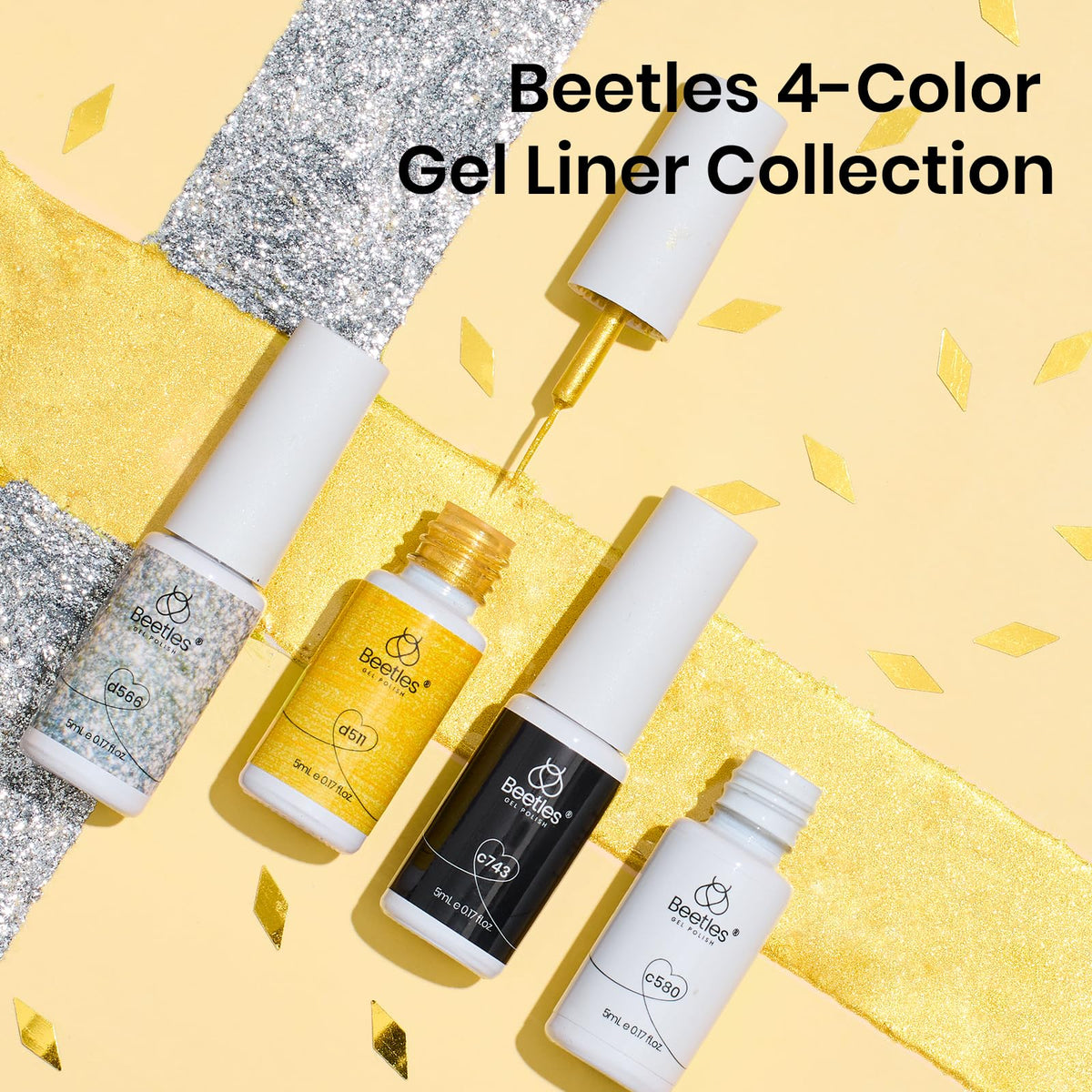 beetles holiday manicure with gold and silver accents demonstrating festive nail styling