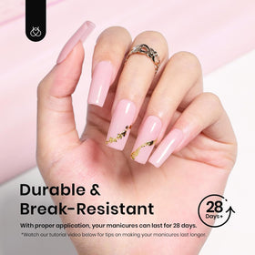 beetles nail tips in use during glue-on application for fast manicure