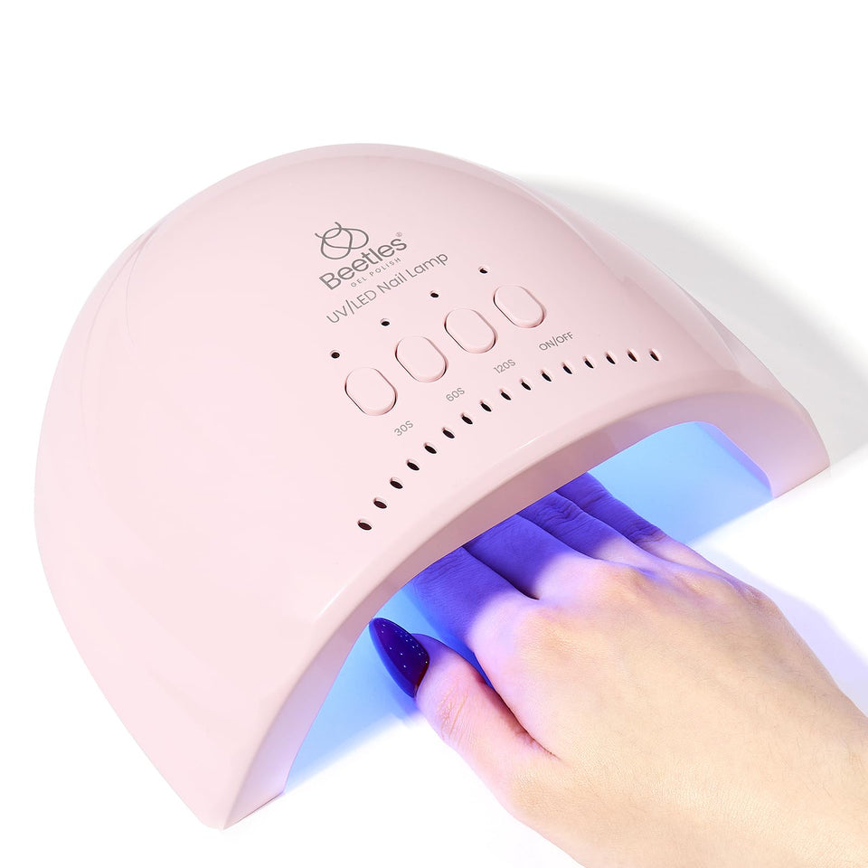 beetles front view of lamp showing opening and pink finish benefiting neat placement