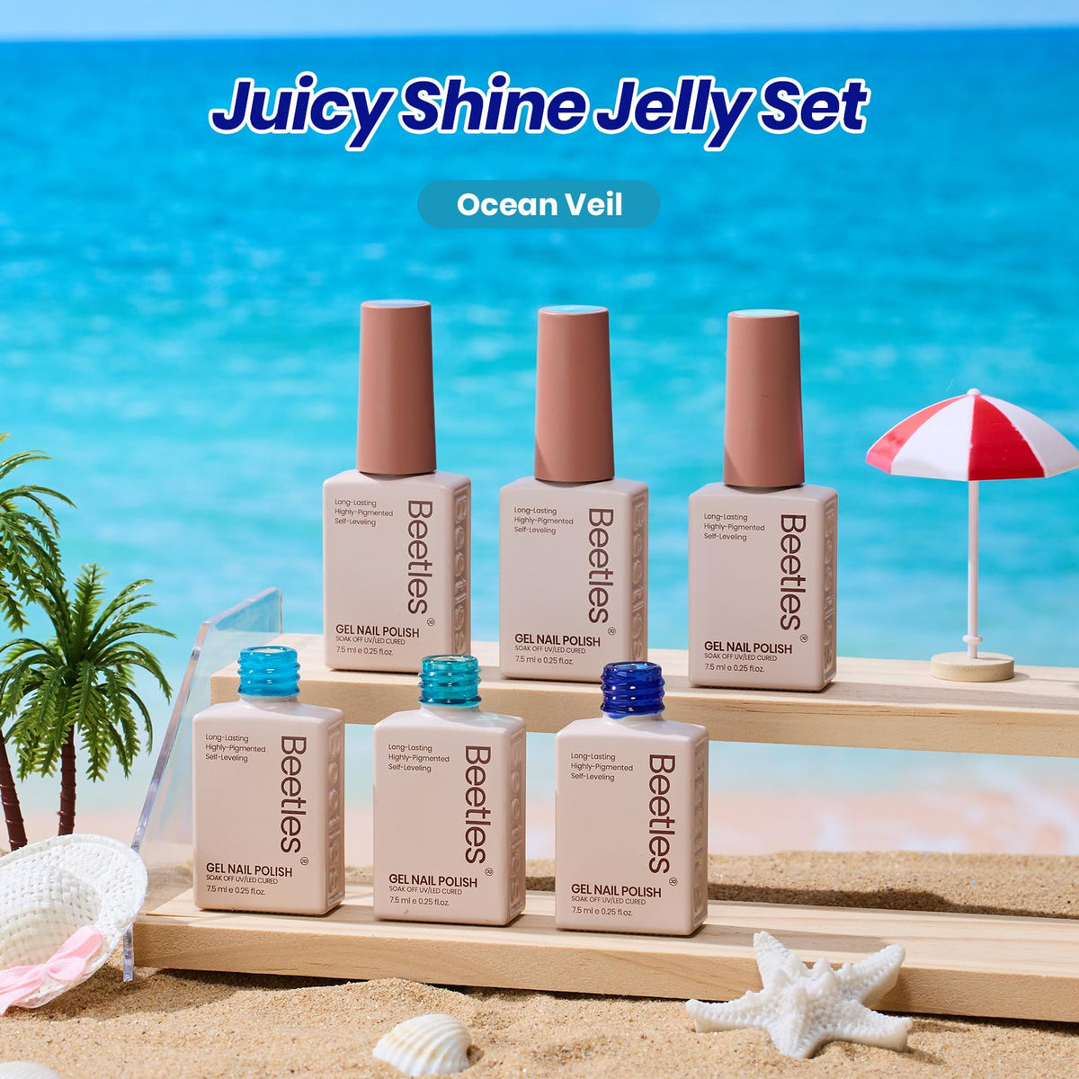 Beetles manicured hands on a beach setting illustrating summery, translucent nail looks for vacations