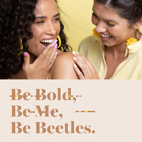 beetles lifestyle manicure scene showing glossy finished nails for confidence
