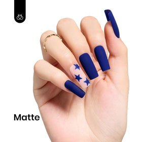 beetles cured manicure on hands in sunlight highlighting glossy salon-quality finish