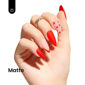 Beetles polish applied to nail tip showing even pigment and glossy finish