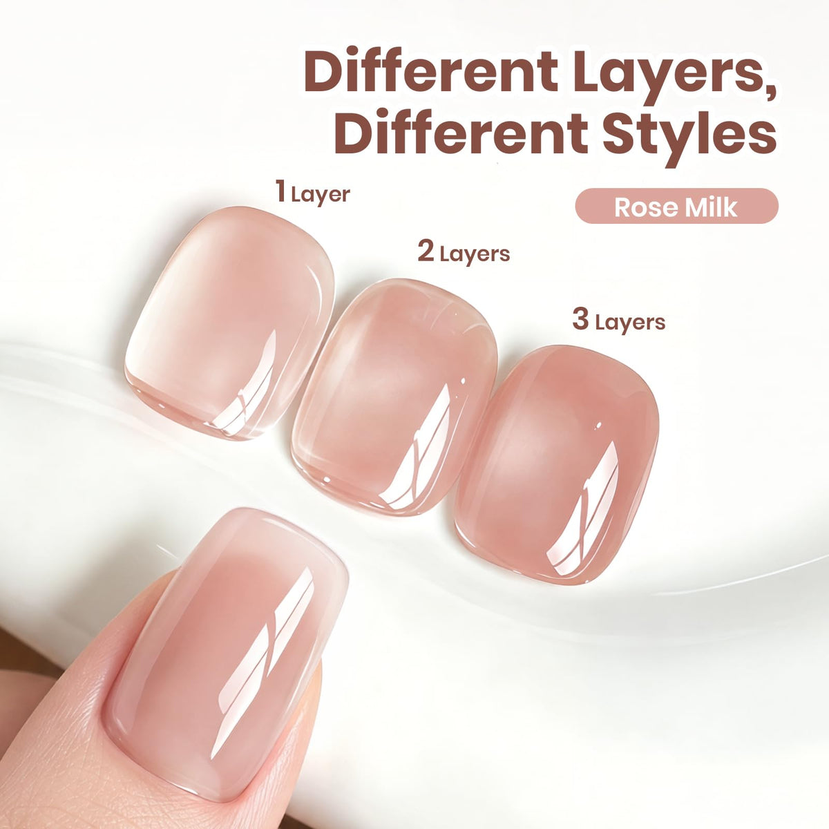 Hand with Rose Milk manicure showing Beetles natural nude look and versatility