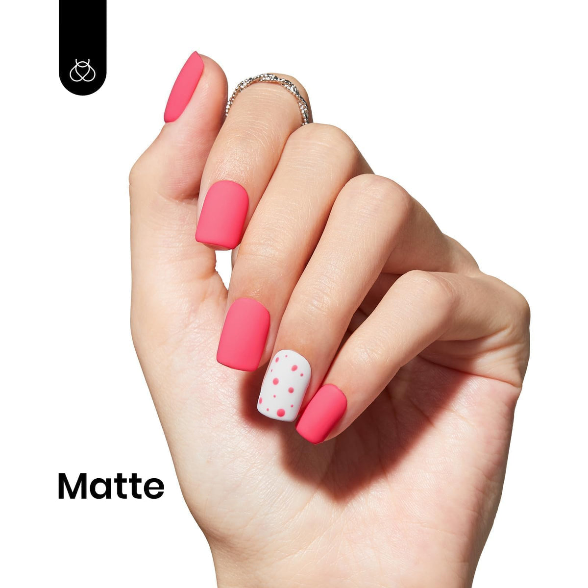 Hand with cured Beetles Strawberry Cocktail nails showing glossy salon finish