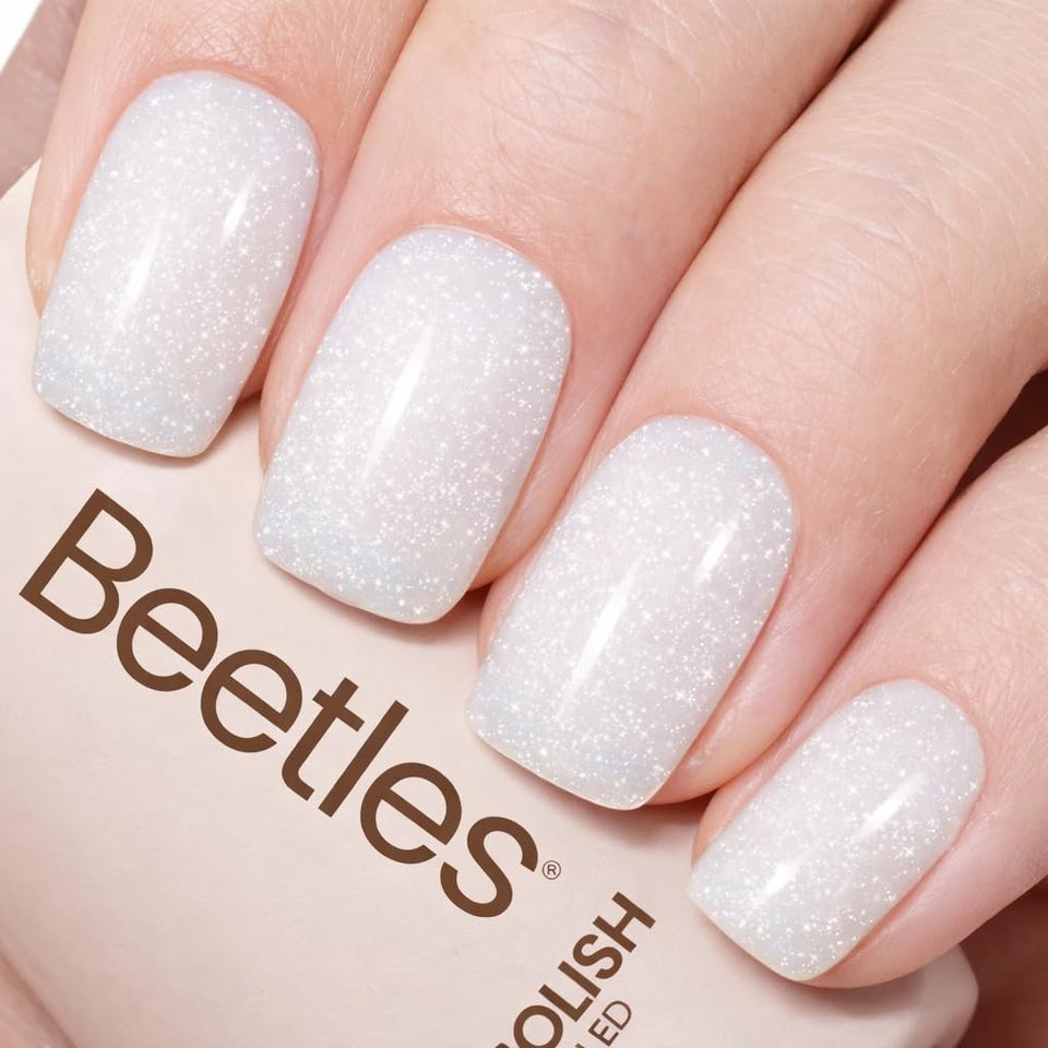 Beetles bottle front view showing milky shimmer polish and label benefits