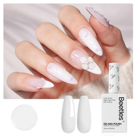 beetles hand model wearing white gel showing elegant manicure and everyday wearable style