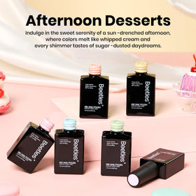 Beetles worn manicure on hand outdoors showing pastel finish and sunlight-resistant shine