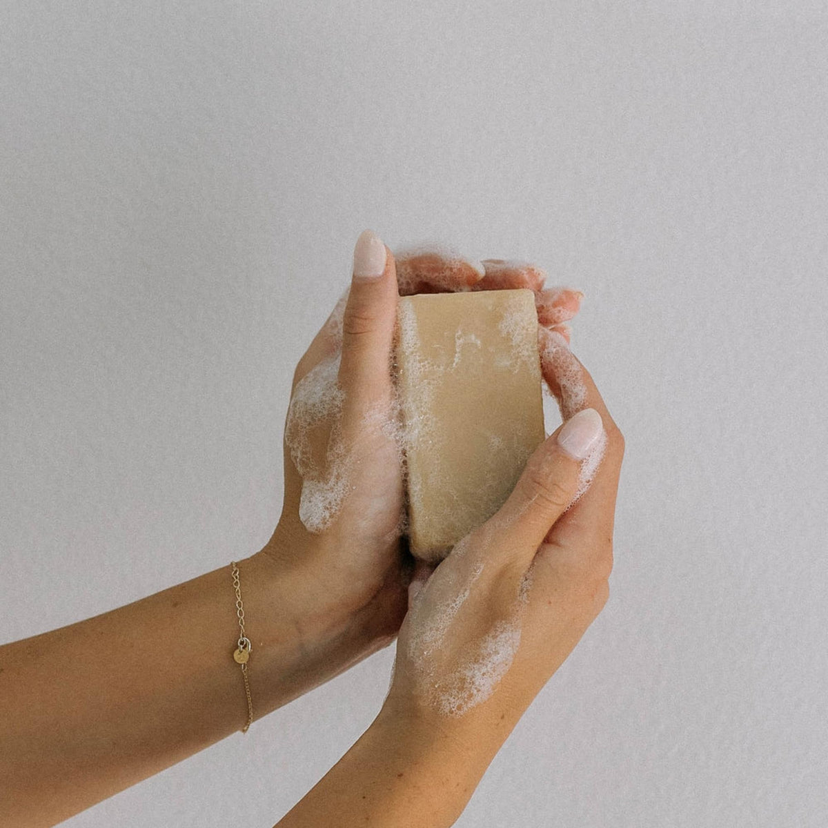 Bathroom scene with Bend Soap Company bars by sink showing practical everyday use and clean design