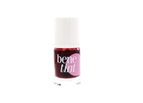 Benefit Benetint size comparison next to lipstick showing compact travel-friendly bottle
