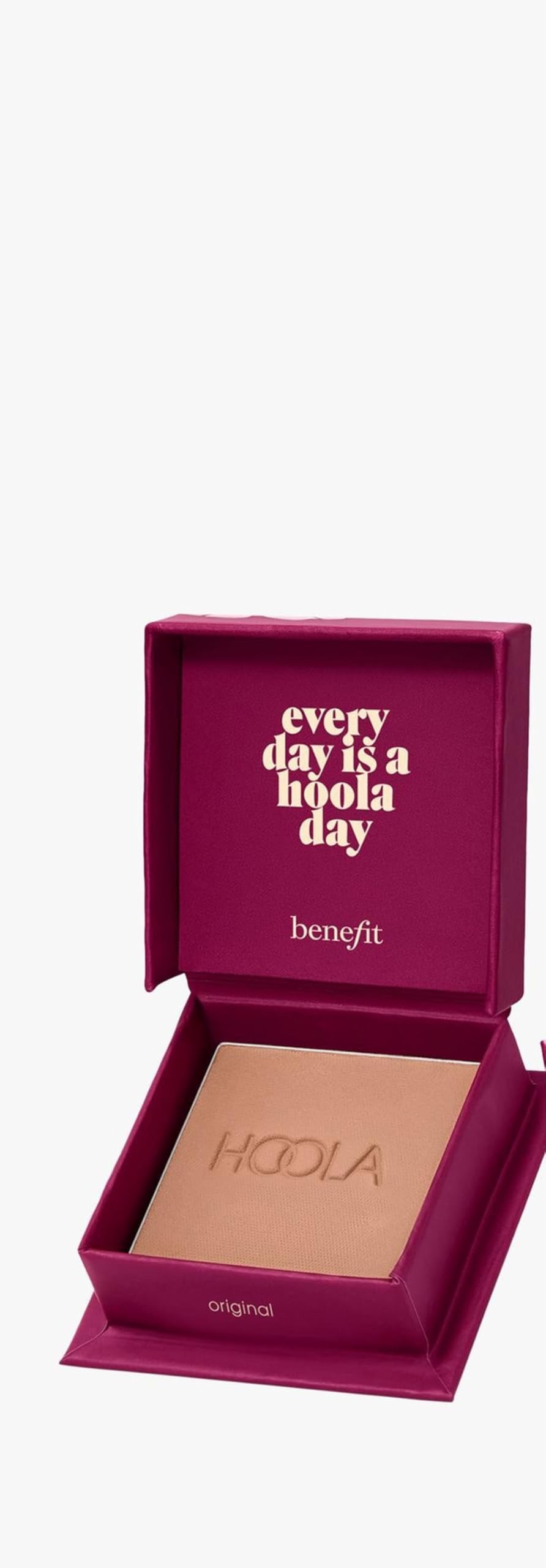 Benefit Hoola applied in outdoor setting showing natural-looking sun-kissed warmth