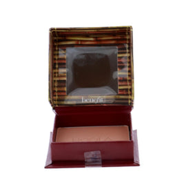 Benefit Hoola being applied with brush, adds natural warmth and subtle contour